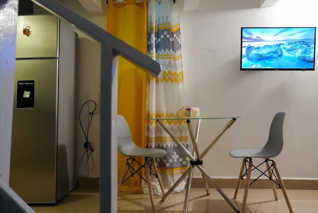 TV a/nebo společenská místnost v ubytování Casa Ballenas2