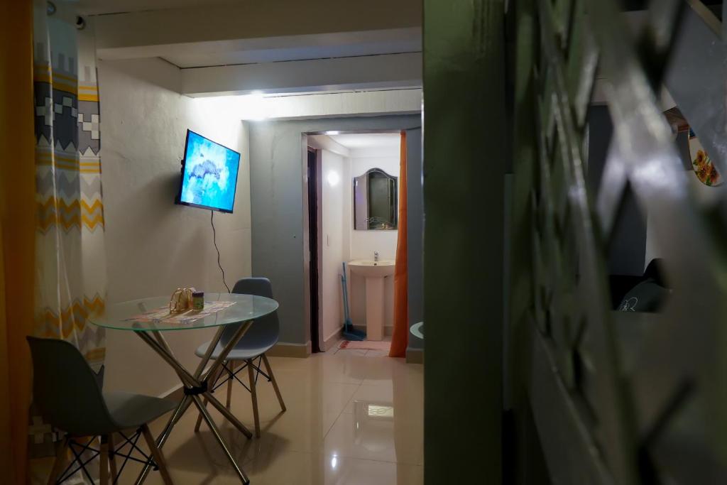 TV a/nebo společenská místnost v ubytování Casa Ballenas2