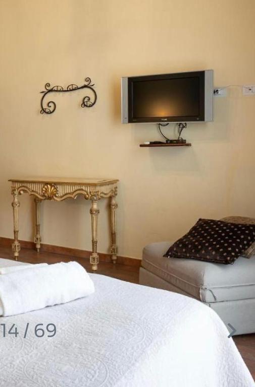 Postel nebo postele na pokoji v ubytování B&B Ares Charme