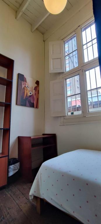 Letto o letti in una camera di Flying Dog Hostel