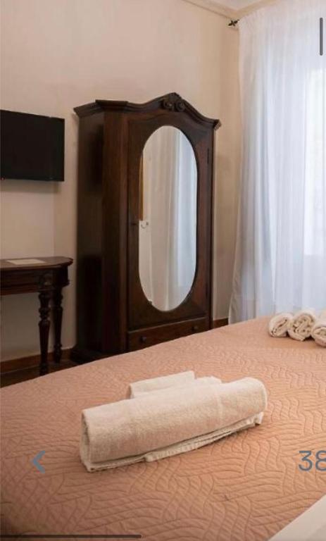 Postel nebo postele na pokoji v ubytování B&B Ares Charme