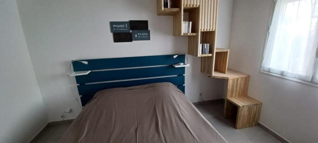 Postel nebo postele na pokoji v ubytování Appartement neuf a 150 metres de la mer wifi