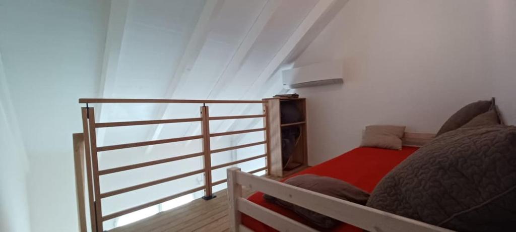 Postel nebo postele na pokoji v ubytování Appartement neuf a 150 metres de la mer wifi
