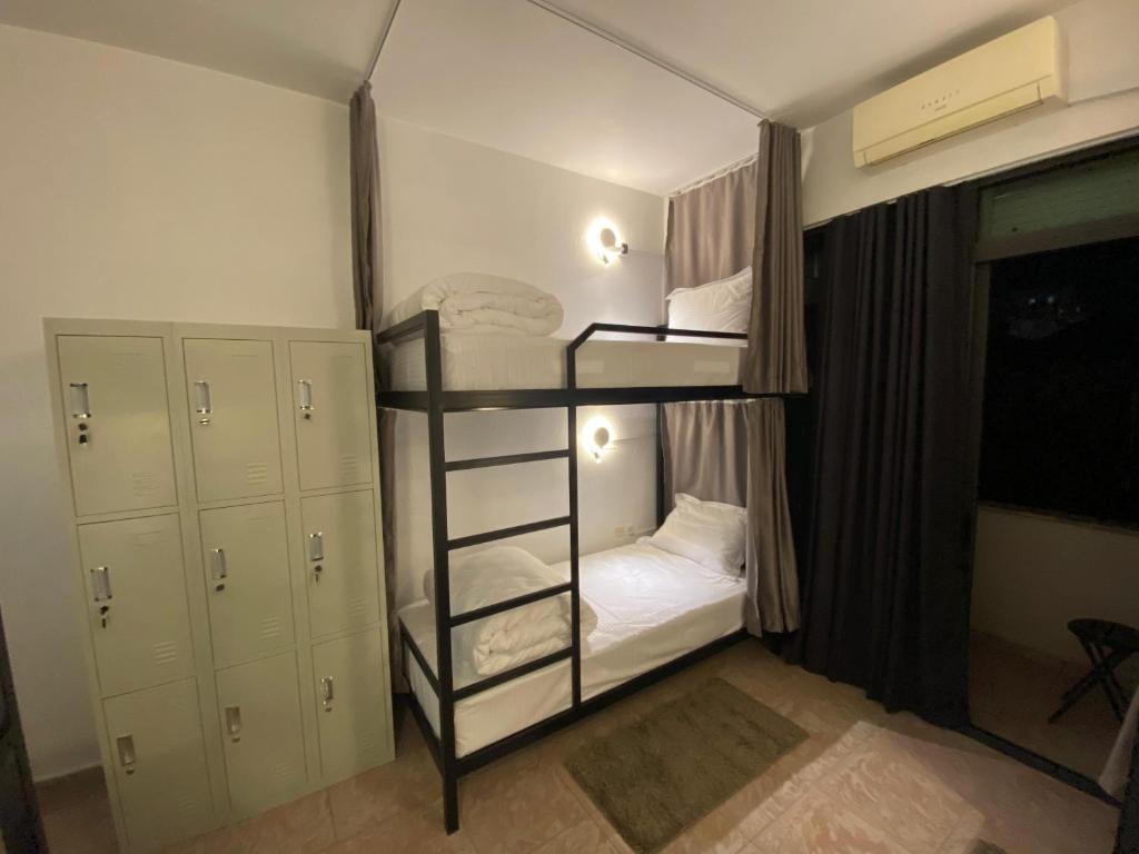 Postel nebo postele na pokoji v ubytování New Bazaar Hostel