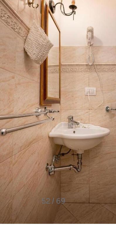 Koupelna v ubytování B&B Ares Charme