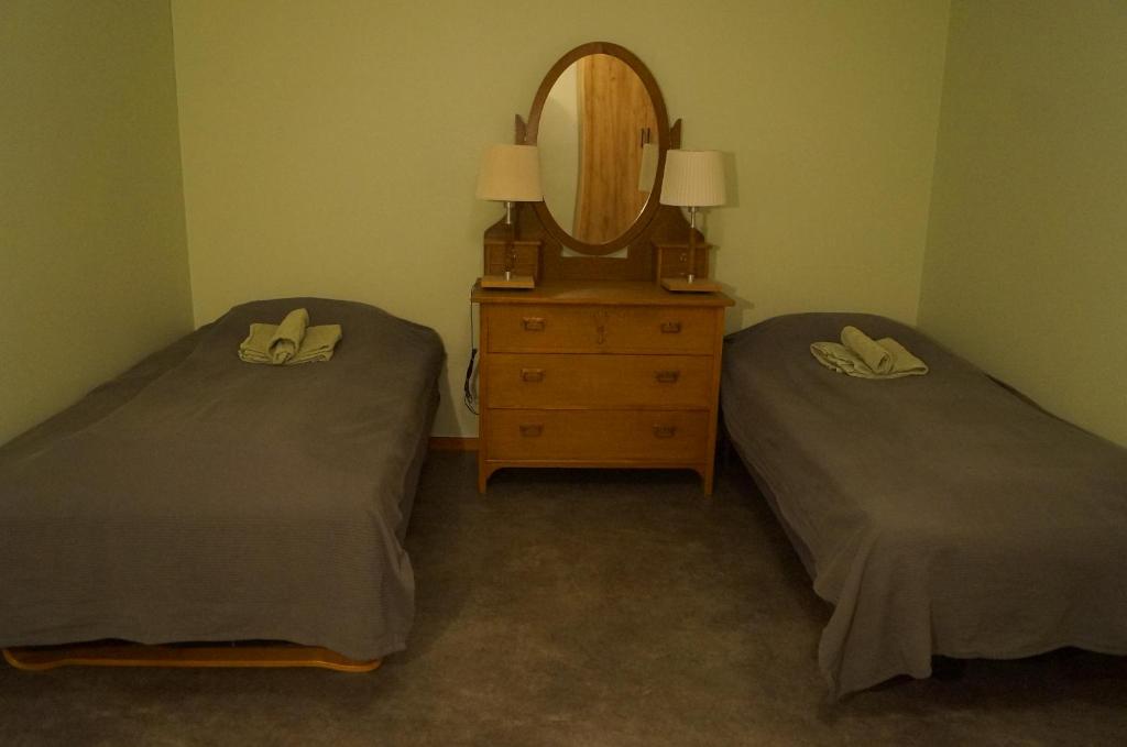 Postel nebo postele na pokoji v ubytování Laplanders rooms