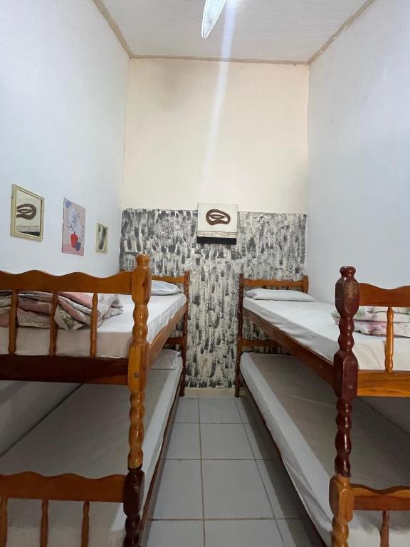 Postel nebo postele na pokoji v ubytování Suites Lauberge