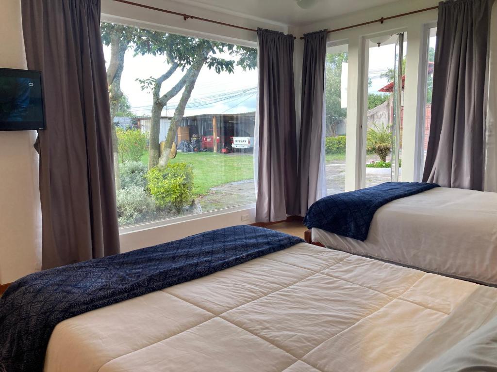 Postel nebo postele na pokoji v ubytování Apricot Hotel