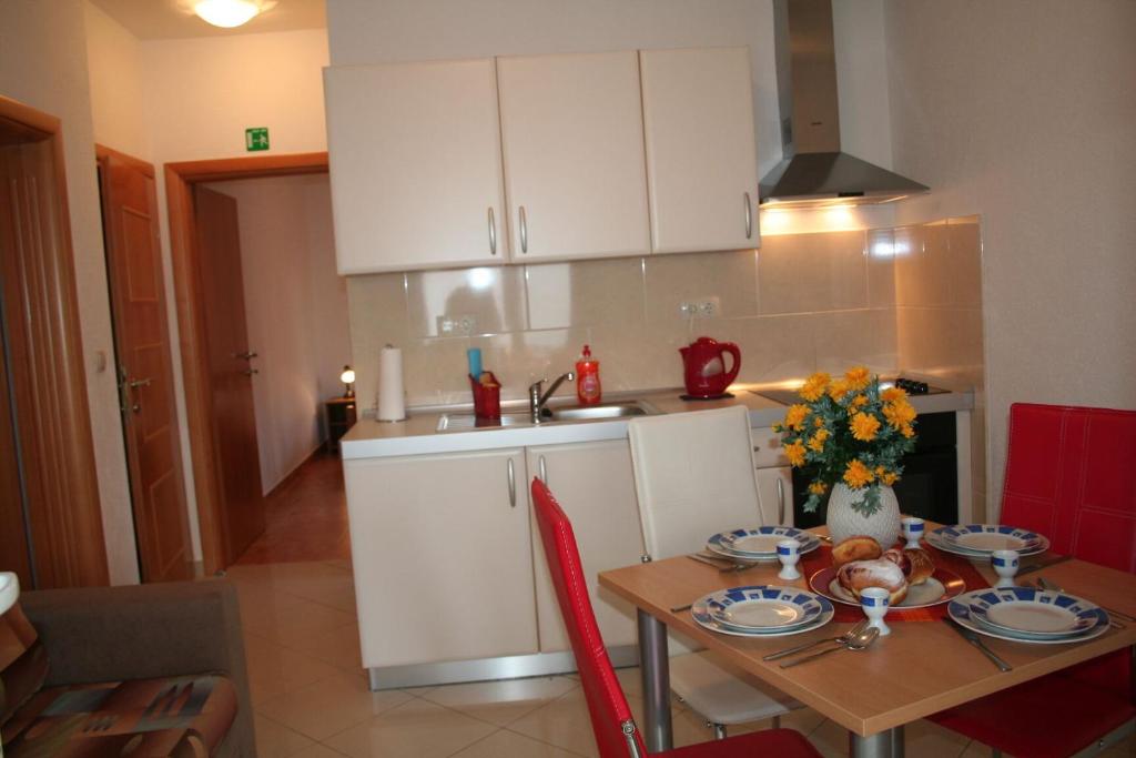 Kuchyňa alebo kuchynka v ubytovaní Apartments Central