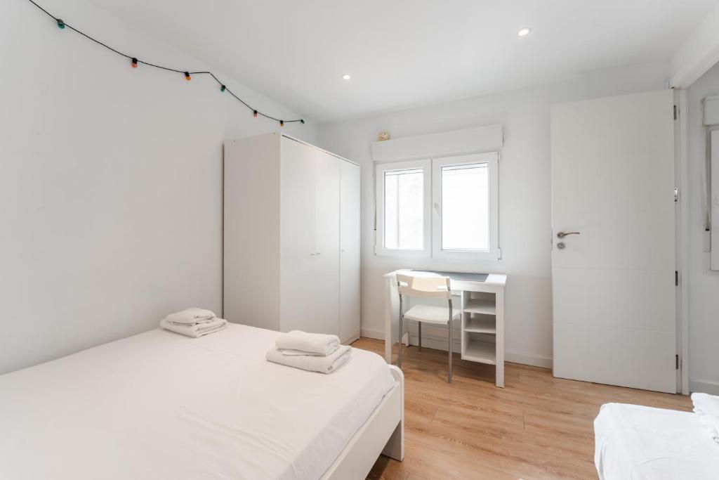 Postel nebo postele na pokoji v ubytování Feel Welcome Barcelona Smart flat