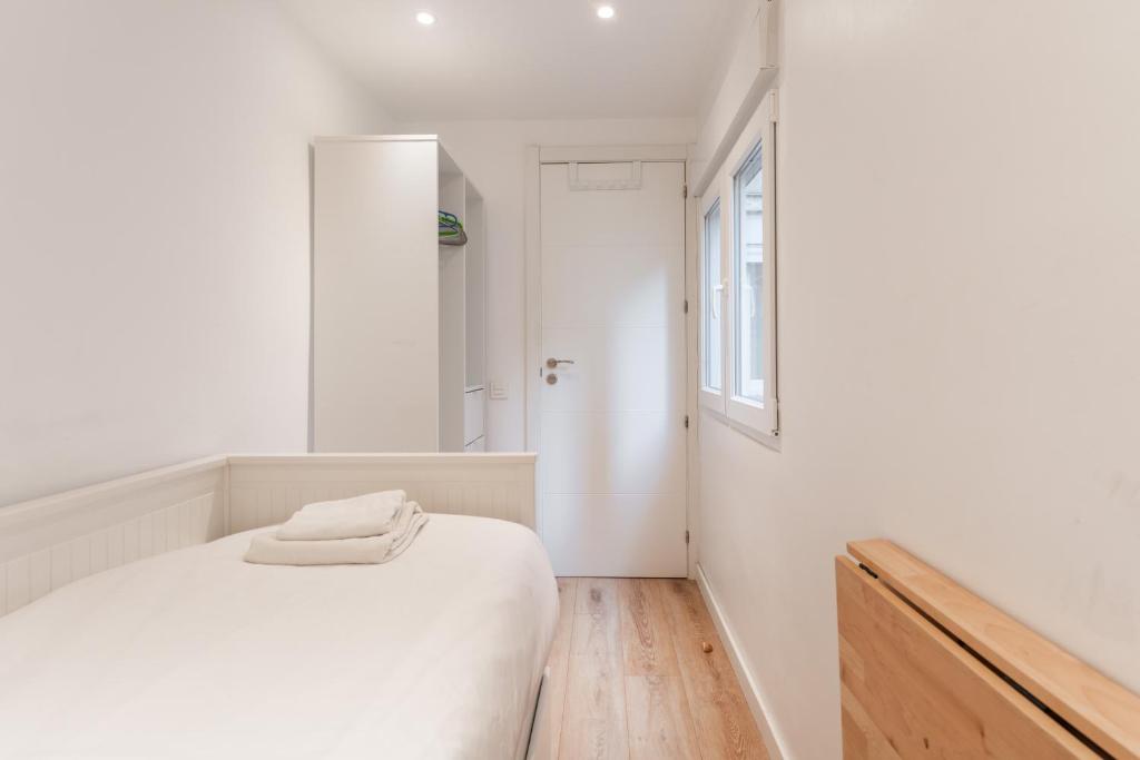 Postel nebo postele na pokoji v ubytování Feel Welcome Barcelona Smart flat