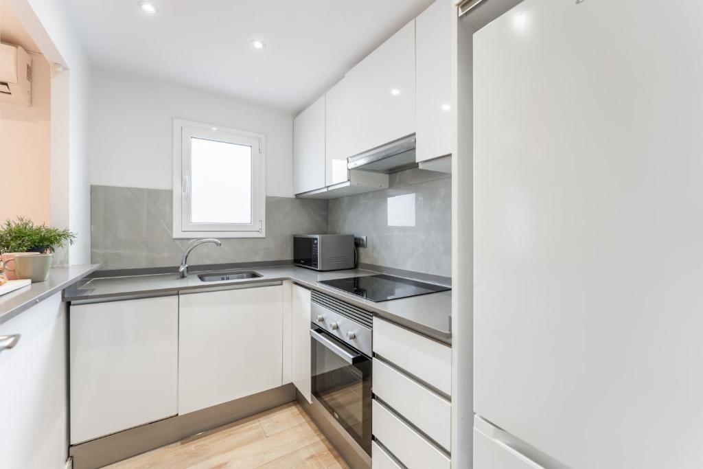 Kuchyň nebo kuchyňský kout v ubytování Feel Welcome Barcelona Smart flat