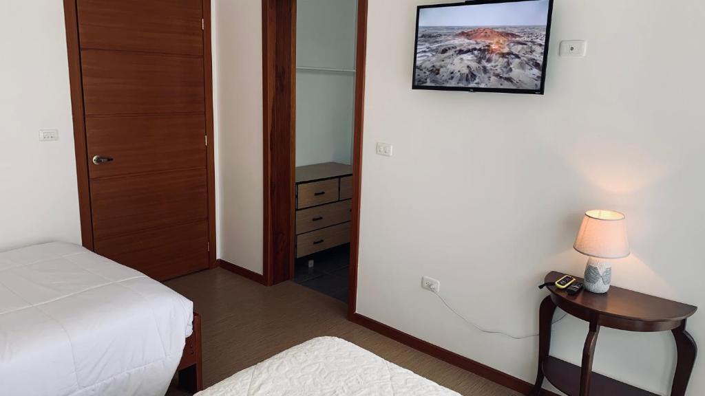 Postel nebo postele na pokoji v ubytování Apricot Hotel