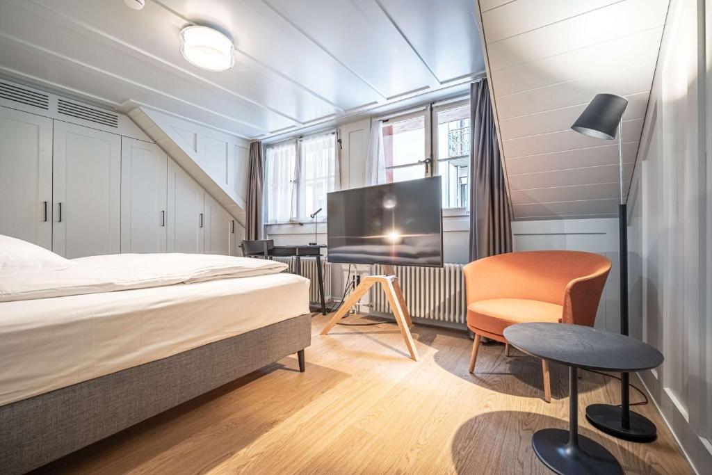Televisyen dan/atau pusat hiburan di Best Western Plus Hotel Bern