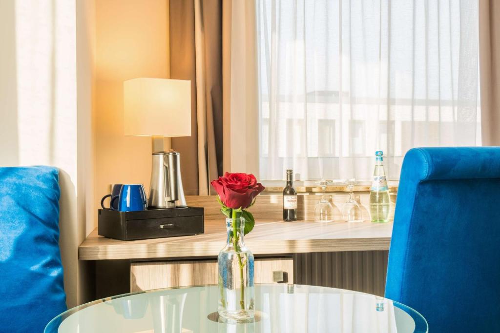 Příslušenství pro přípravu čaje a kávy v ubytování Best Western Plus Hotel Regence