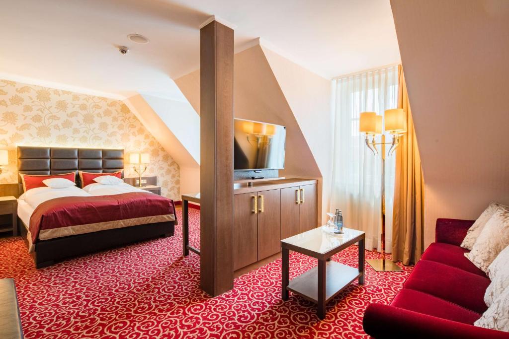 Postel nebo postele na pokoji v ubytování Best Western Plus Hotel StadtPalais