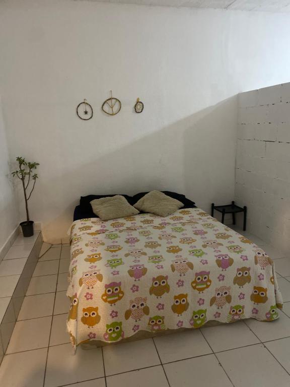 Postel nebo postele na pokoji v ubytování SURF CAFÉ hospedagem