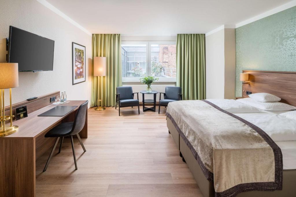 Postel nebo postele na pokoji v ubytování Best Western Plus Hotel Excelsior