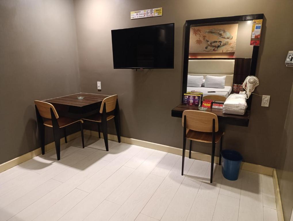 TV a/nebo společenská místnost v ubytování Hotel Sogo Quirino