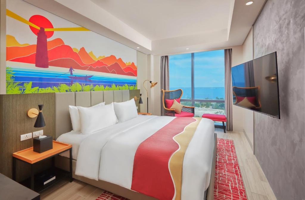 Postel nebo postele na pokoji v ubytování Belmont Hotel Mactan