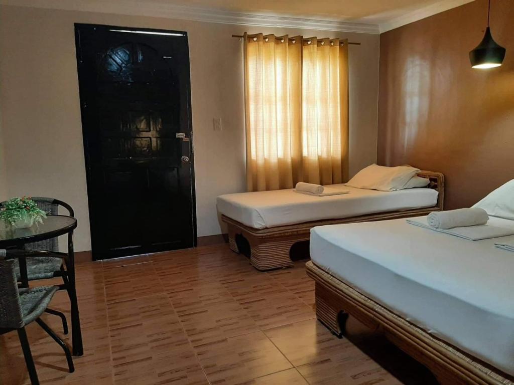 Postel nebo postele na pokoji v ubytování Panglao Grande Resort 邦劳美丽度假村