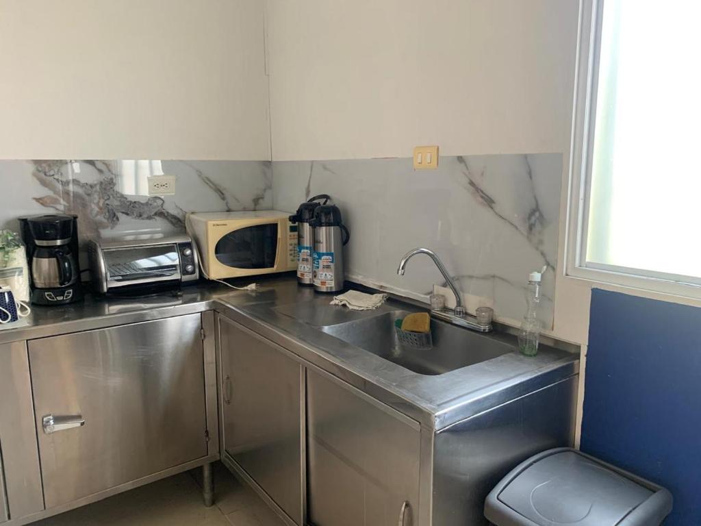 Una cocina o cocineta en Casa Mango