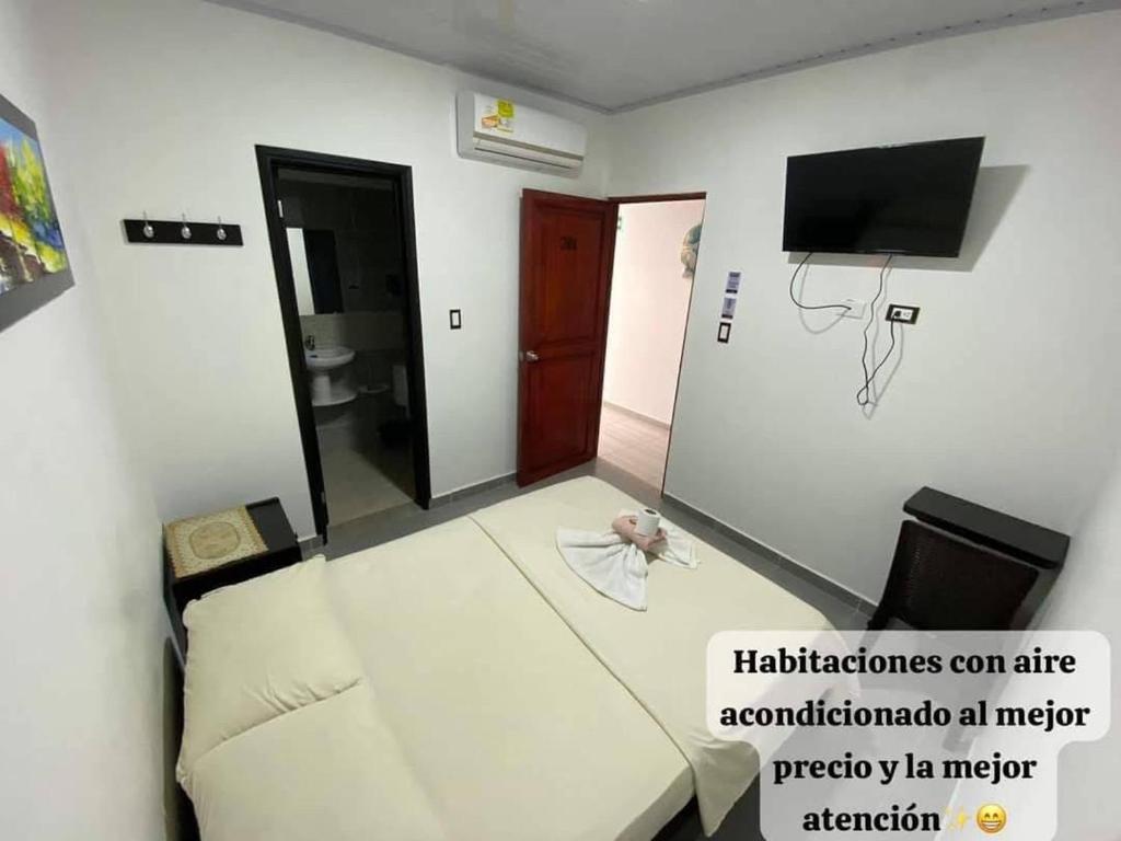 TV a/nebo společenská místnost v ubytování Inmaculada Real Hotel