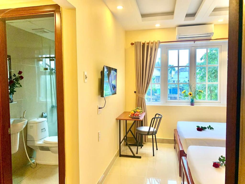 TV/trung tâm giải trí tại Aman Riverside Hotel