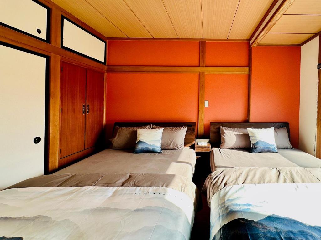 Postel nebo postele na pokoji v ubytování 加美屋リゾート 秩父 庭日和-Kamiya Resort Chichibu Niwabiyori