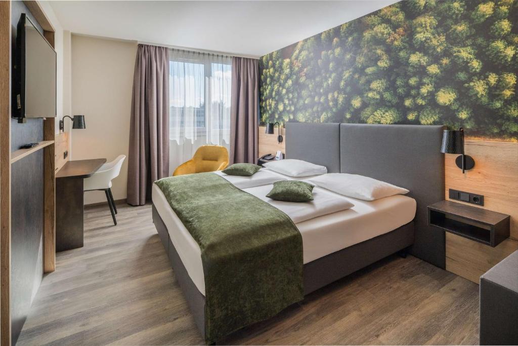 Postel nebo postele na pokoji v ubytování Best Western Hotel München Airport