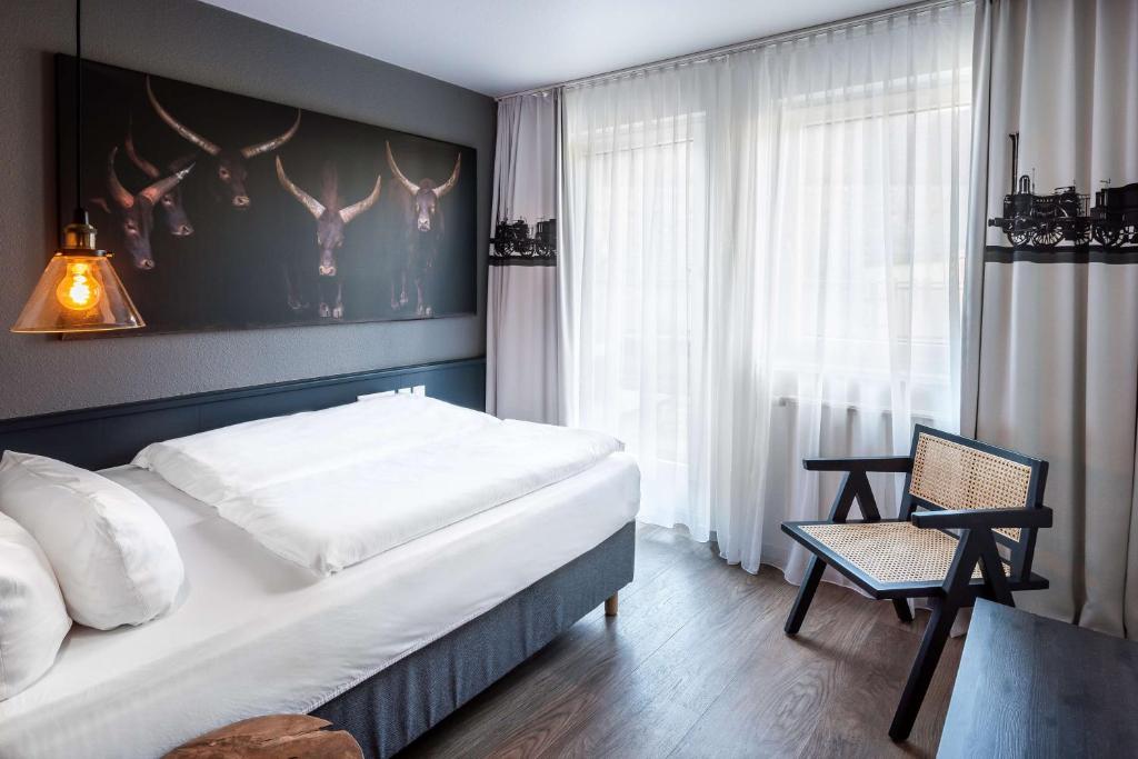 Postel nebo postele na pokoji v ubytování Best Western Hotel Nürnberg am Hauptbahnhof