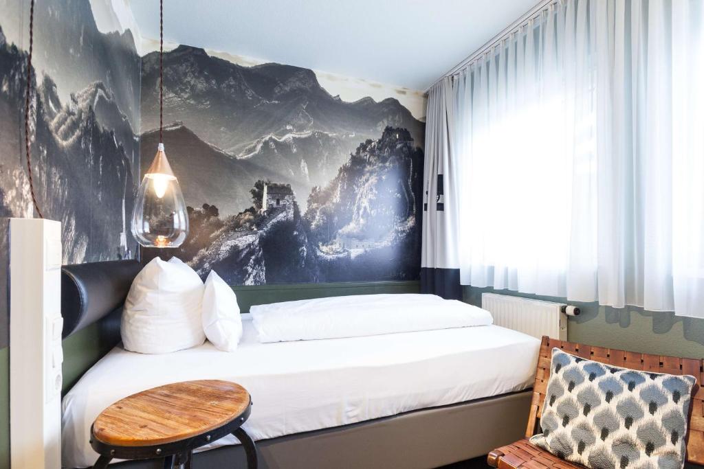 Postel nebo postele na pokoji v ubytování Best Western Hotel Nürnberg am Hauptbahnhof