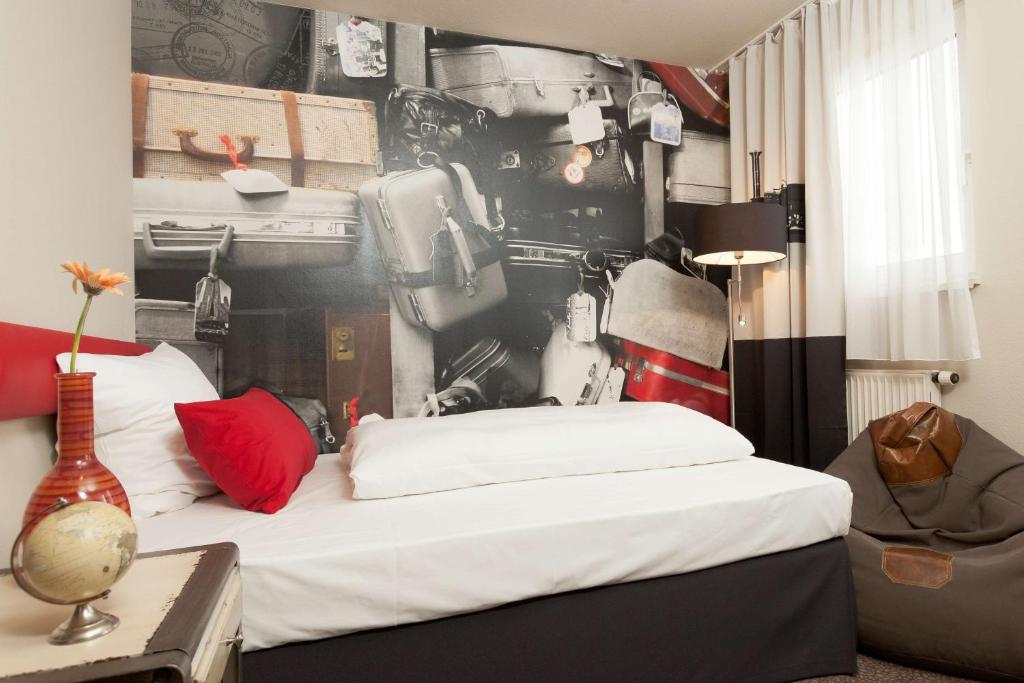 Postel nebo postele na pokoji v ubytování Best Western Hotel Nürnberg am Hauptbahnhof