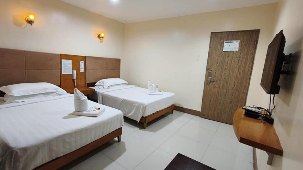 Televisyen dan/atau pusat hiburan di Asia Novo Boutique Hotel - Dumaguete