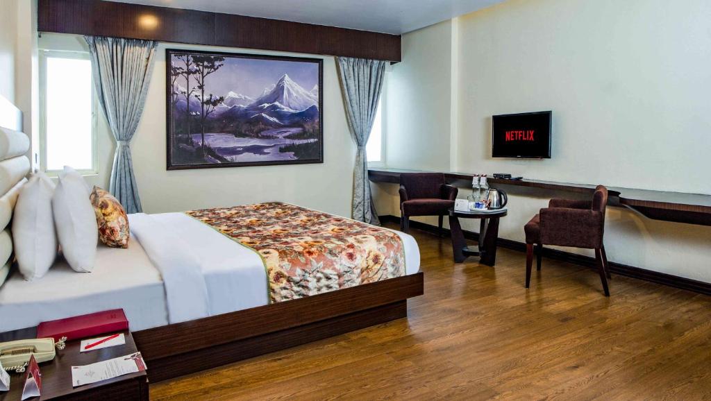 Postel nebo postele na pokoji v ubytování Summit Montana Suites & Spa at Mall