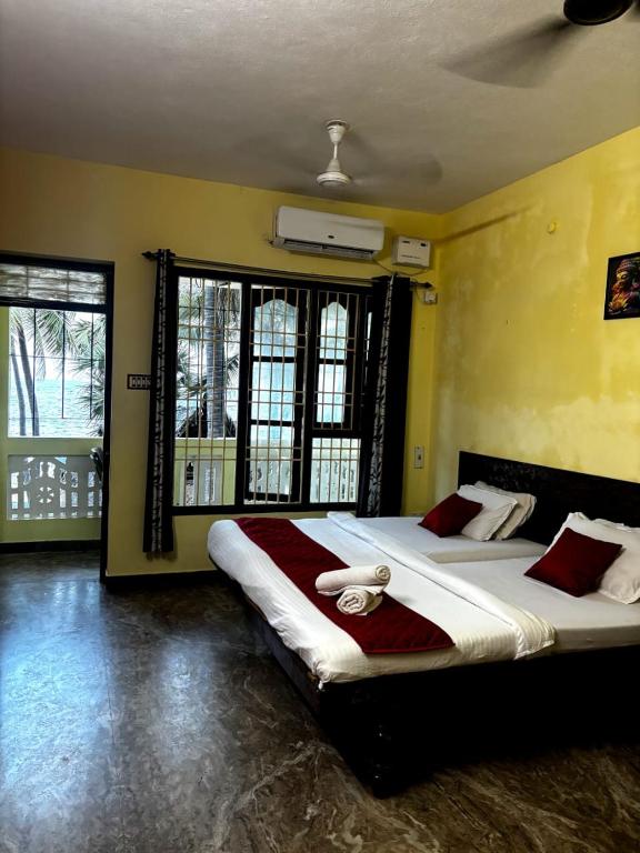 Letto o letti in una camera di The Muthu Beach Resort