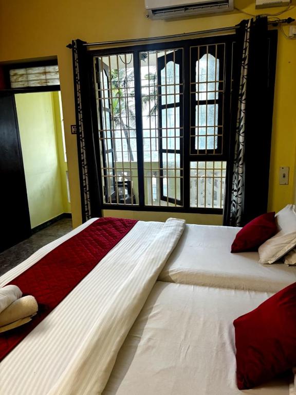 Letto o letti in una camera di The Muthu Beach Resort