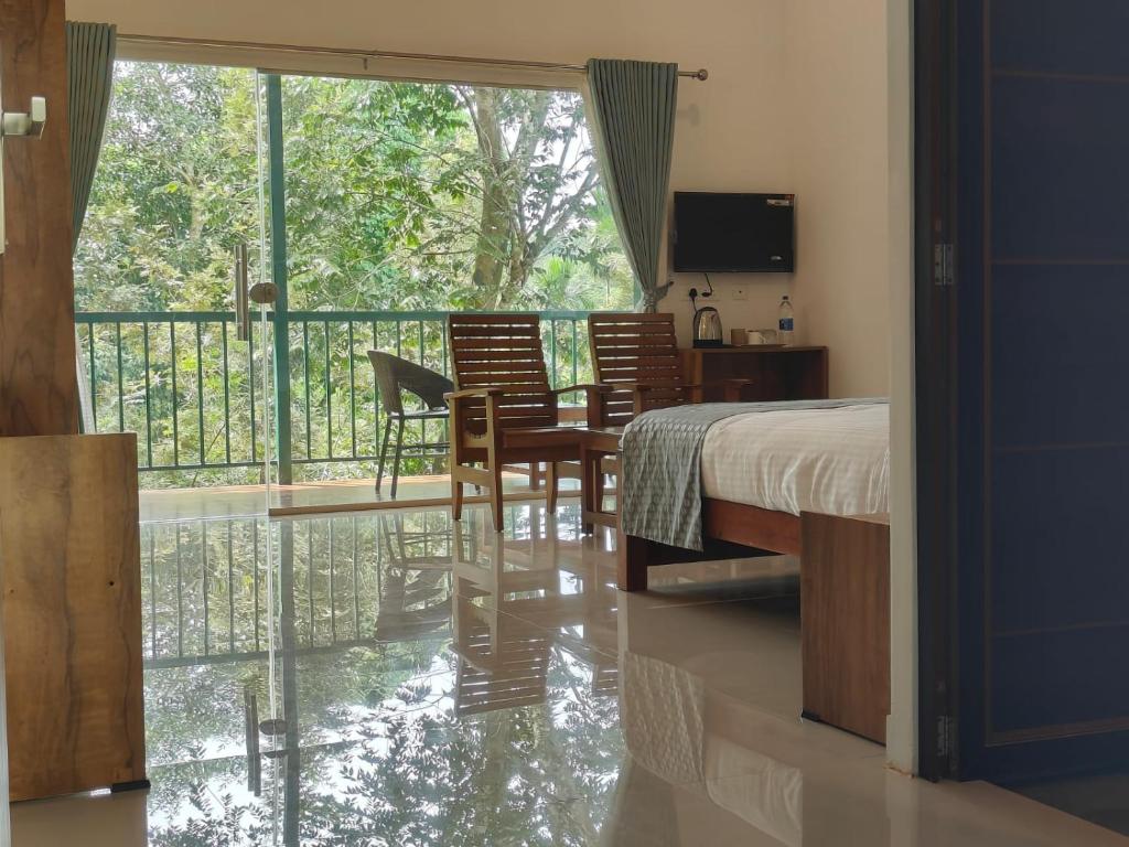 TV a/nebo společenská místnost v ubytování Green Aura Private villas