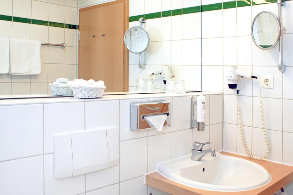 Koupelna v ubytování Best Western Macrander Hotel Dresden