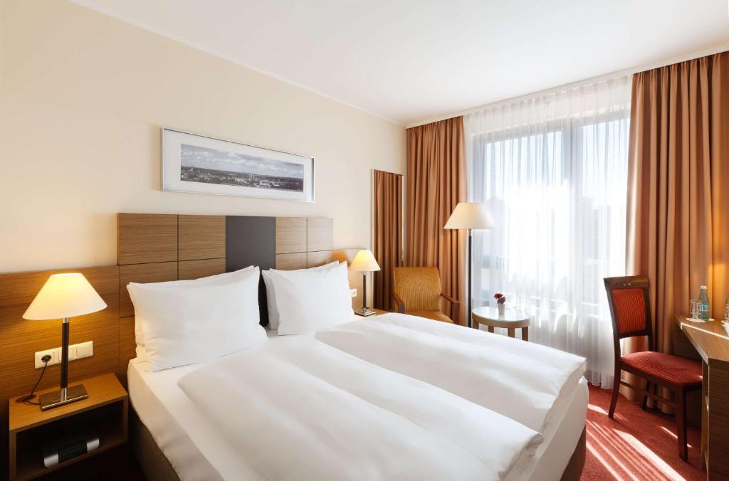 Postel nebo postele na pokoji v ubytování Best Western Hotel Bamberg