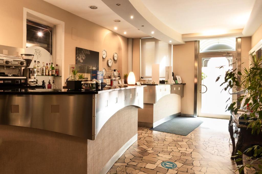Kuchyň nebo kuchyňský kout v ubytování Hotel La Terrazza