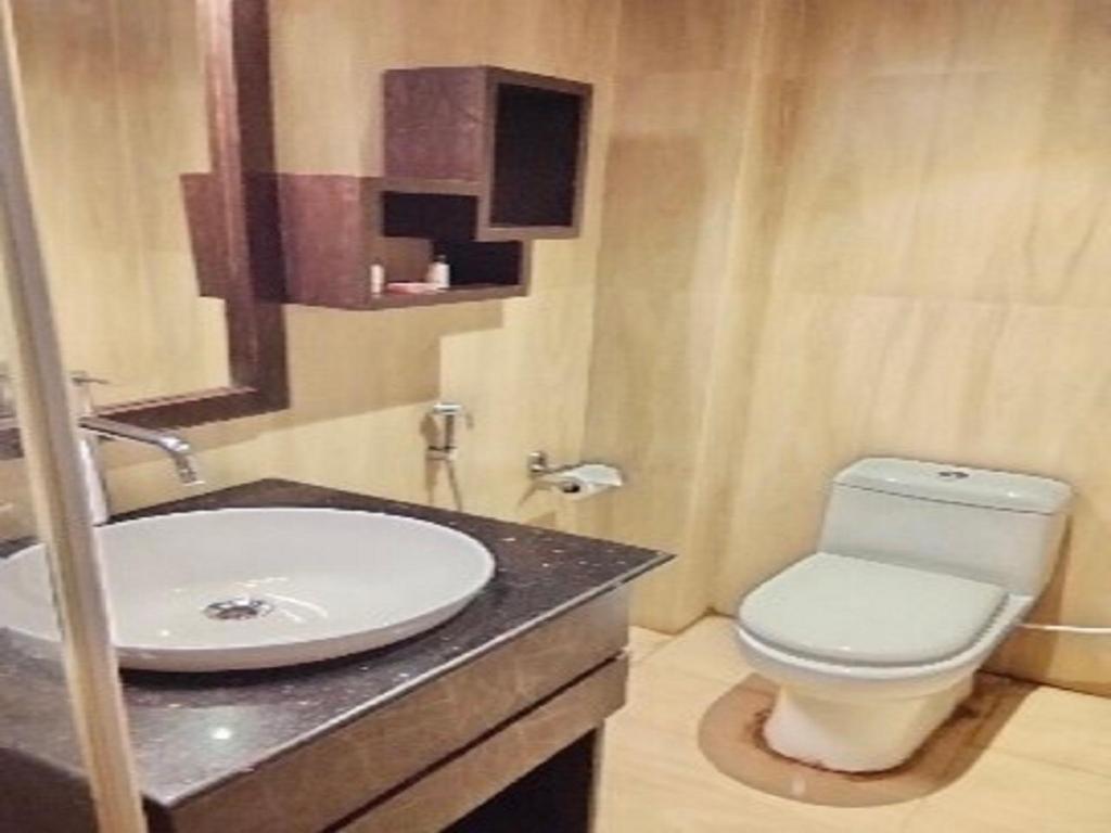Koupelna v ubytování The Citi Residenci Hotel, Bidhannagar