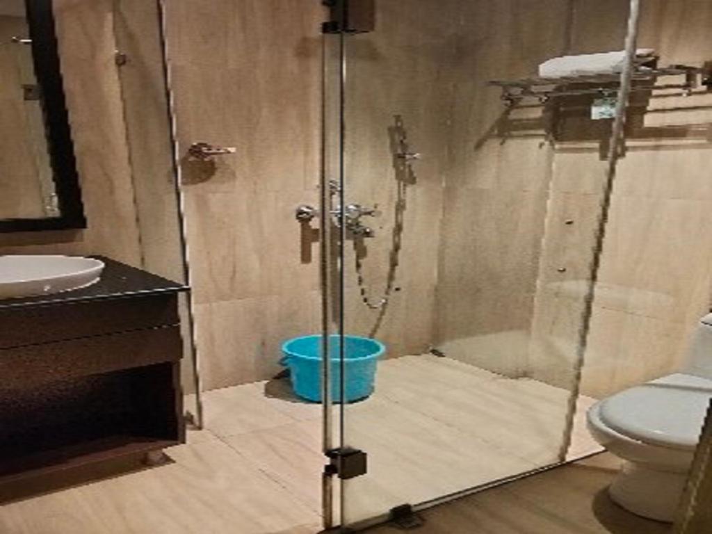 Koupelna v ubytování The Citi Residenci Hotel, Bidhannagar