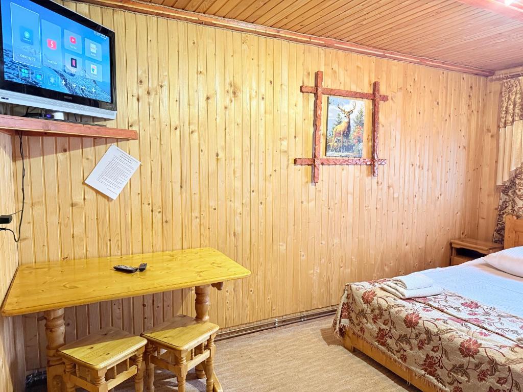 TV a/nebo společenská místnost v ubytování "Як вдома" Буковель