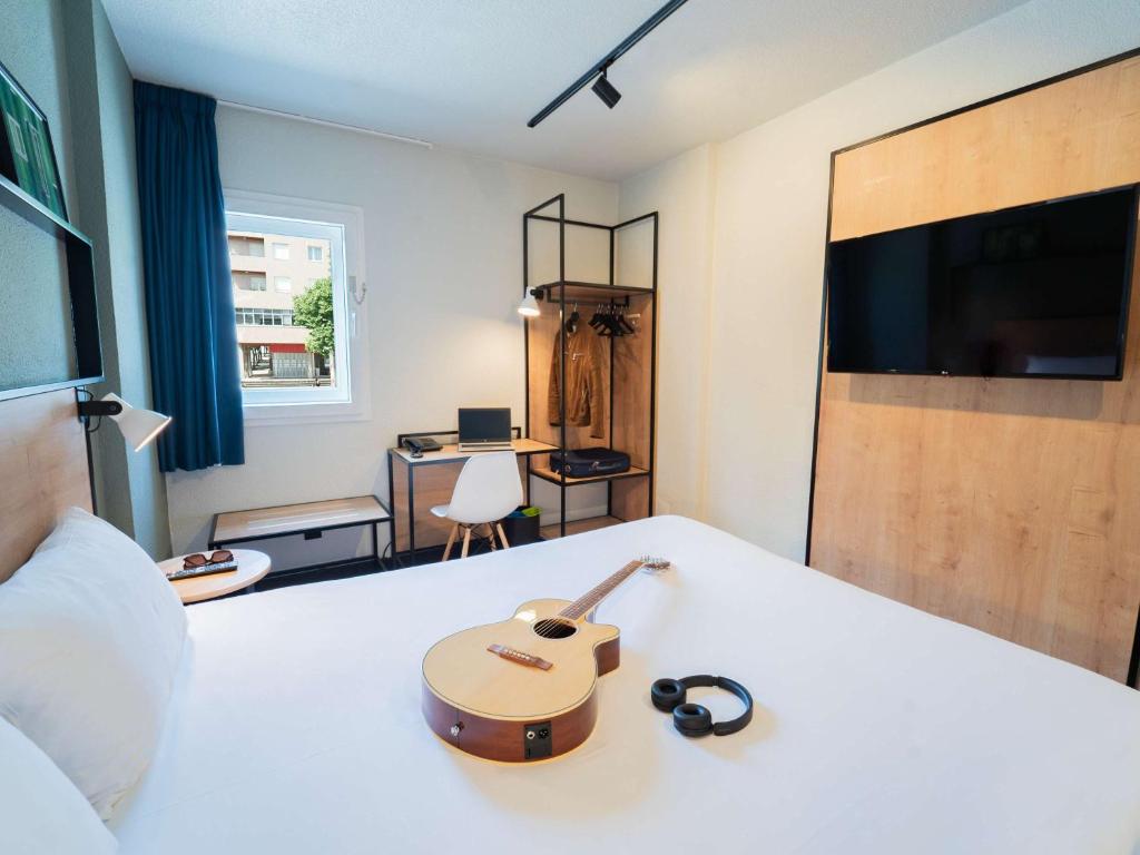 Postel nebo postele na pokoji v ubytování Hotel ibis Guimaraes