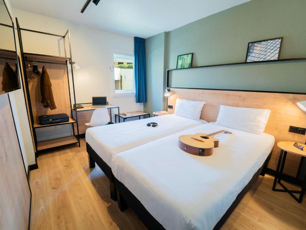Postel nebo postele na pokoji v ubytování Hotel ibis Guimaraes