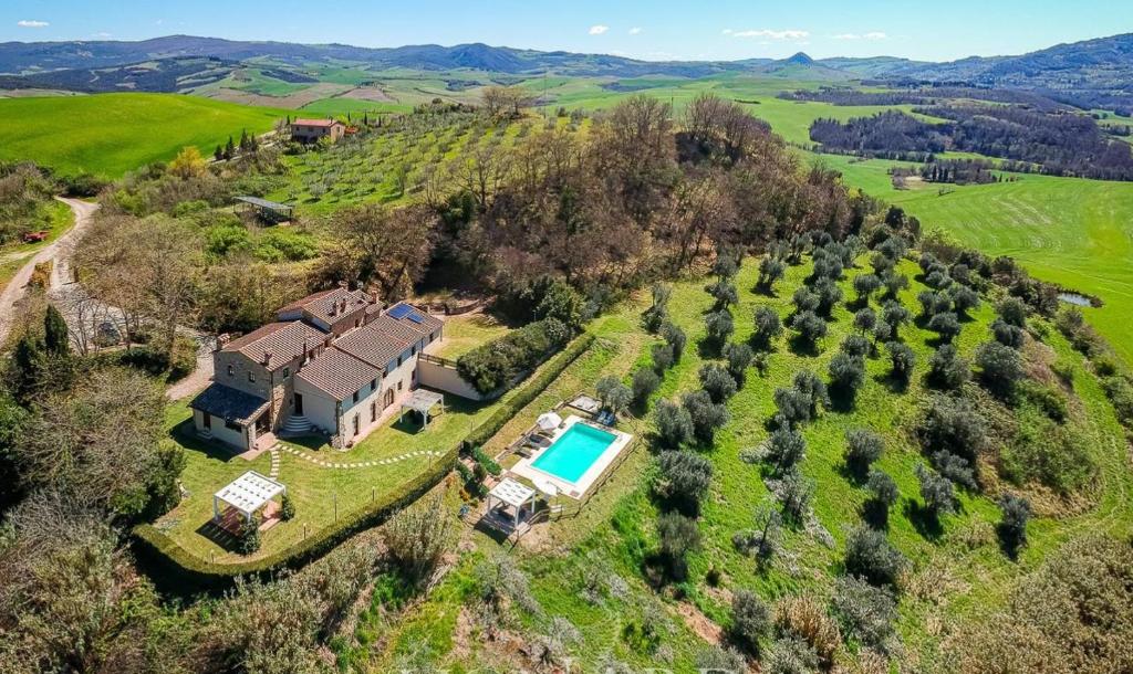 an aerial view of an estate with a swimming pool at Lovely 6 bed Tuscan Farmhouse in Villamagna