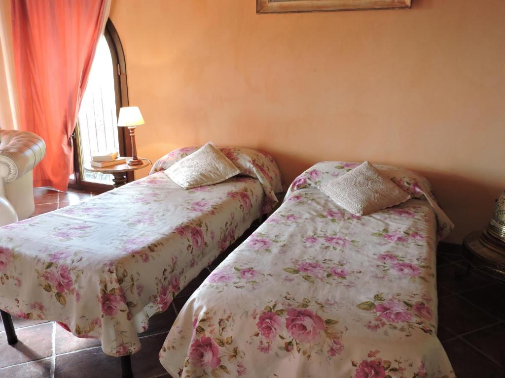Letto o letti in una camera di Casale Fedele Family Relax B&B Vicino al Borgo