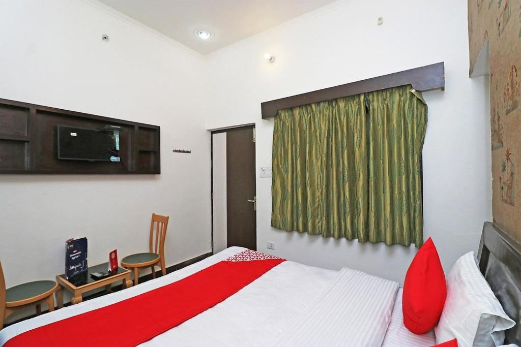 Postel nebo postele na pokoji v ubytování Hotel Amar MLS Heights