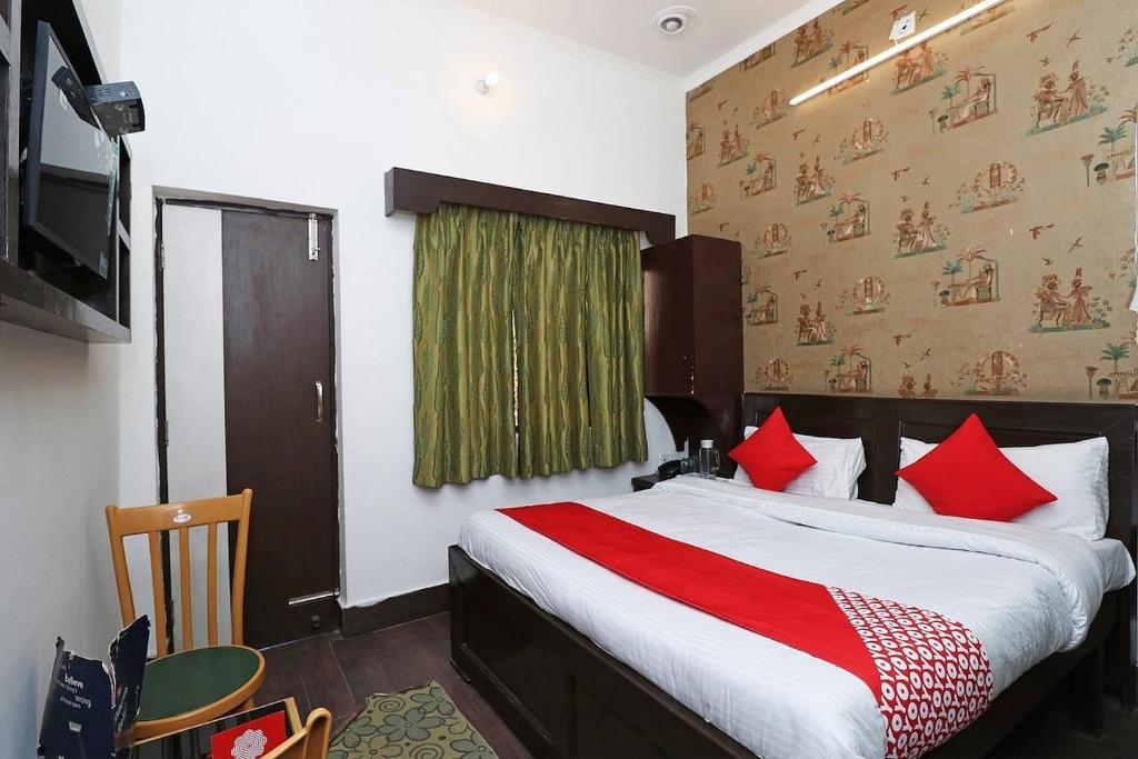 Postel nebo postele na pokoji v ubytování Hotel Amar MLS Heights